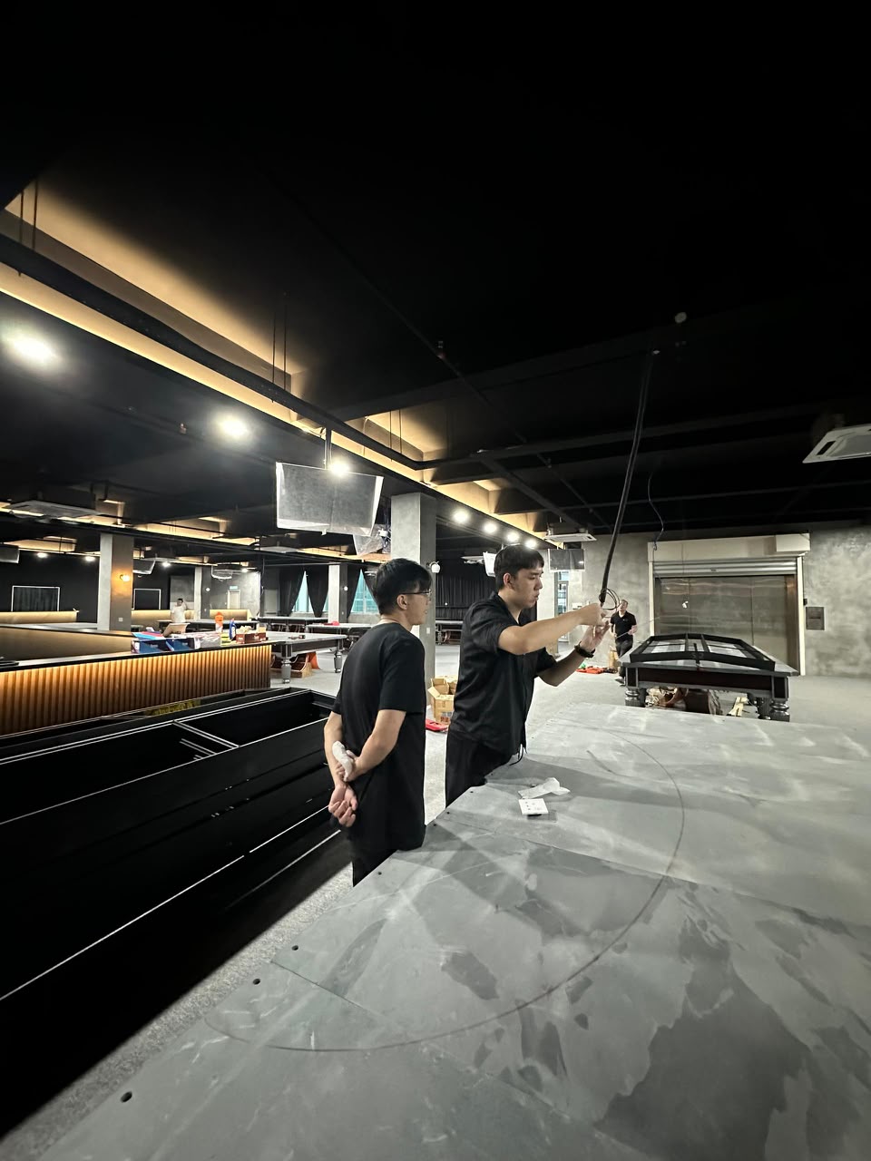 Our team professionally installs Cuezor's smart POS and lighting hardware directly at each merchant's site — from wiring to full system setup — so every venue is up and running with confidence from day one.